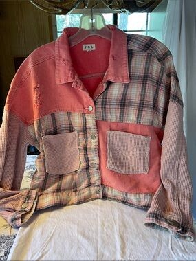 Distressed denim jacket size Small.
